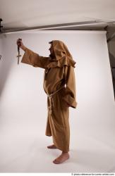 JOEL_ADAMSON MONK WITH CRUCIFIX